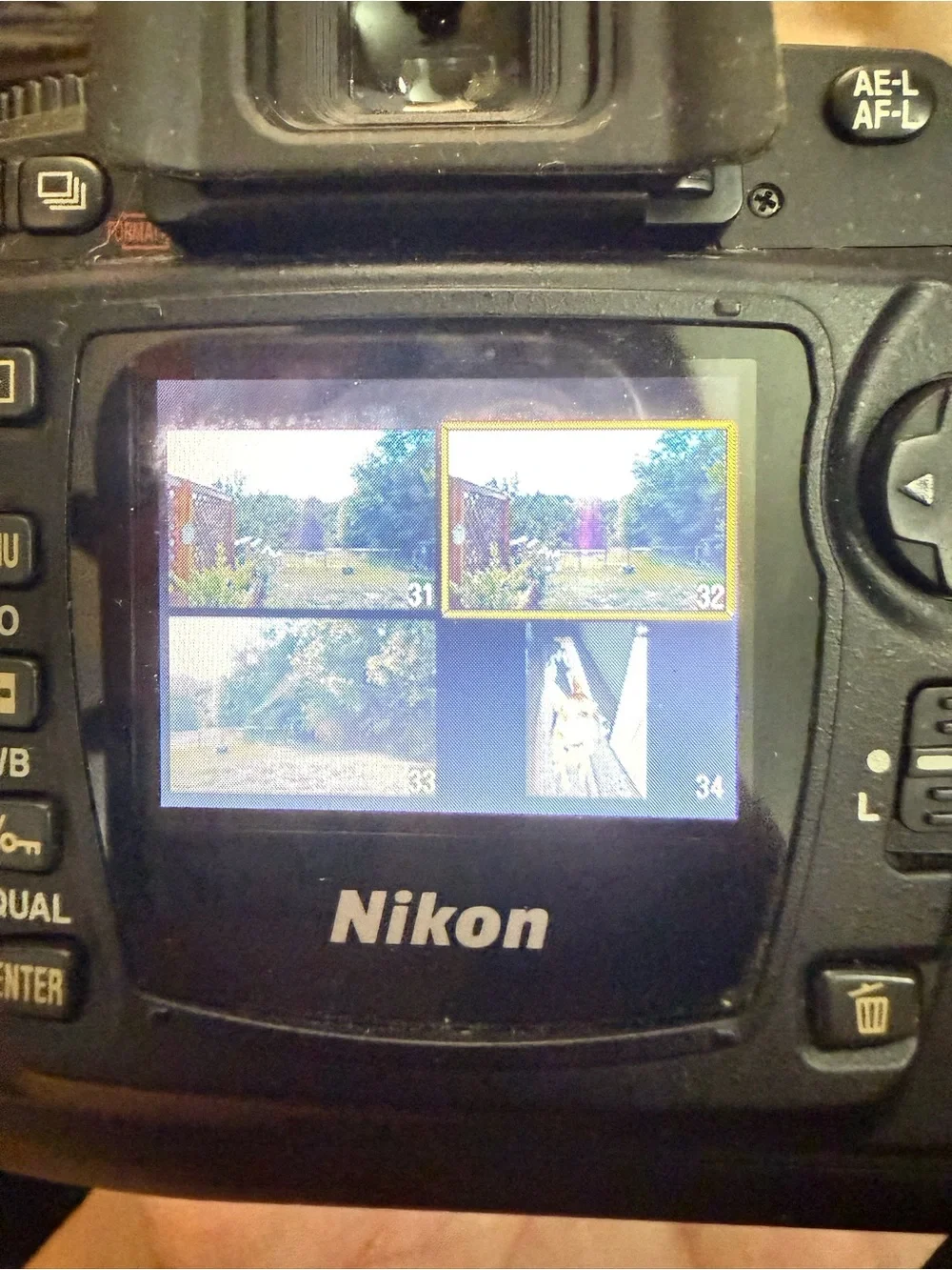 Nikon DSLR Camera in Black with Attached Lens